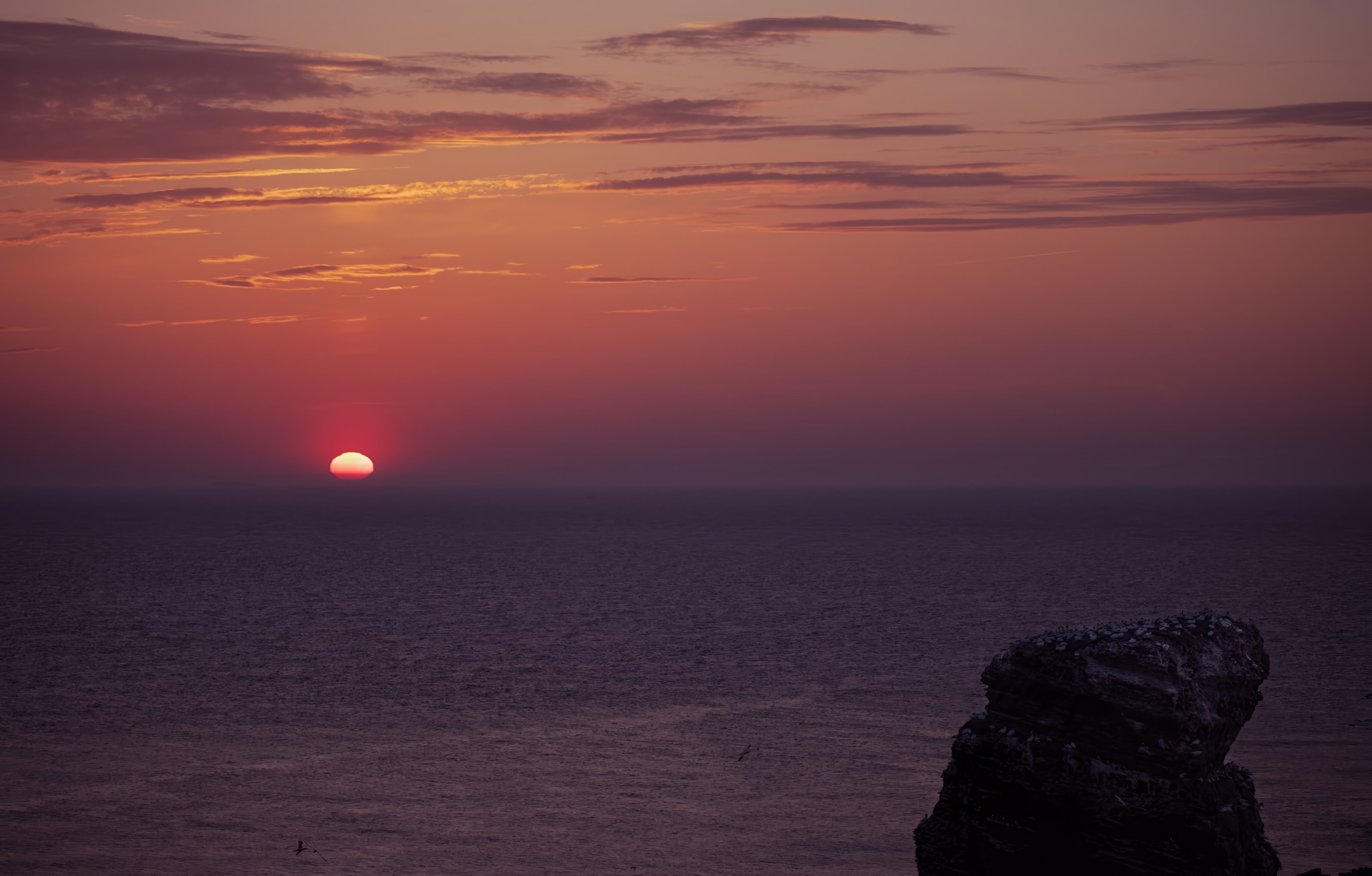 Zach&oacute;d słońca nad Morzem P&oacute;łnocnym - widok z klifu